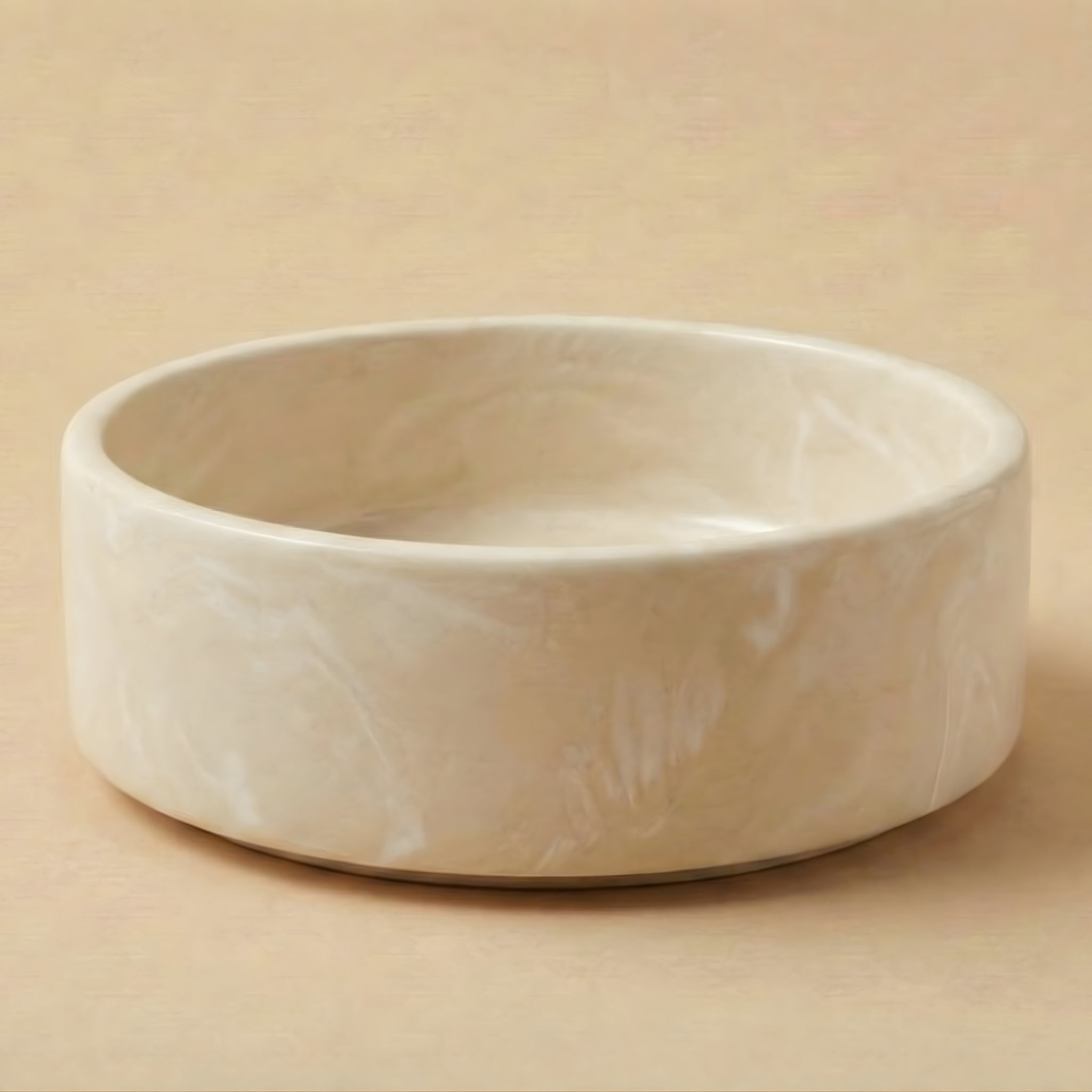 White ceramic bowl on a beige background